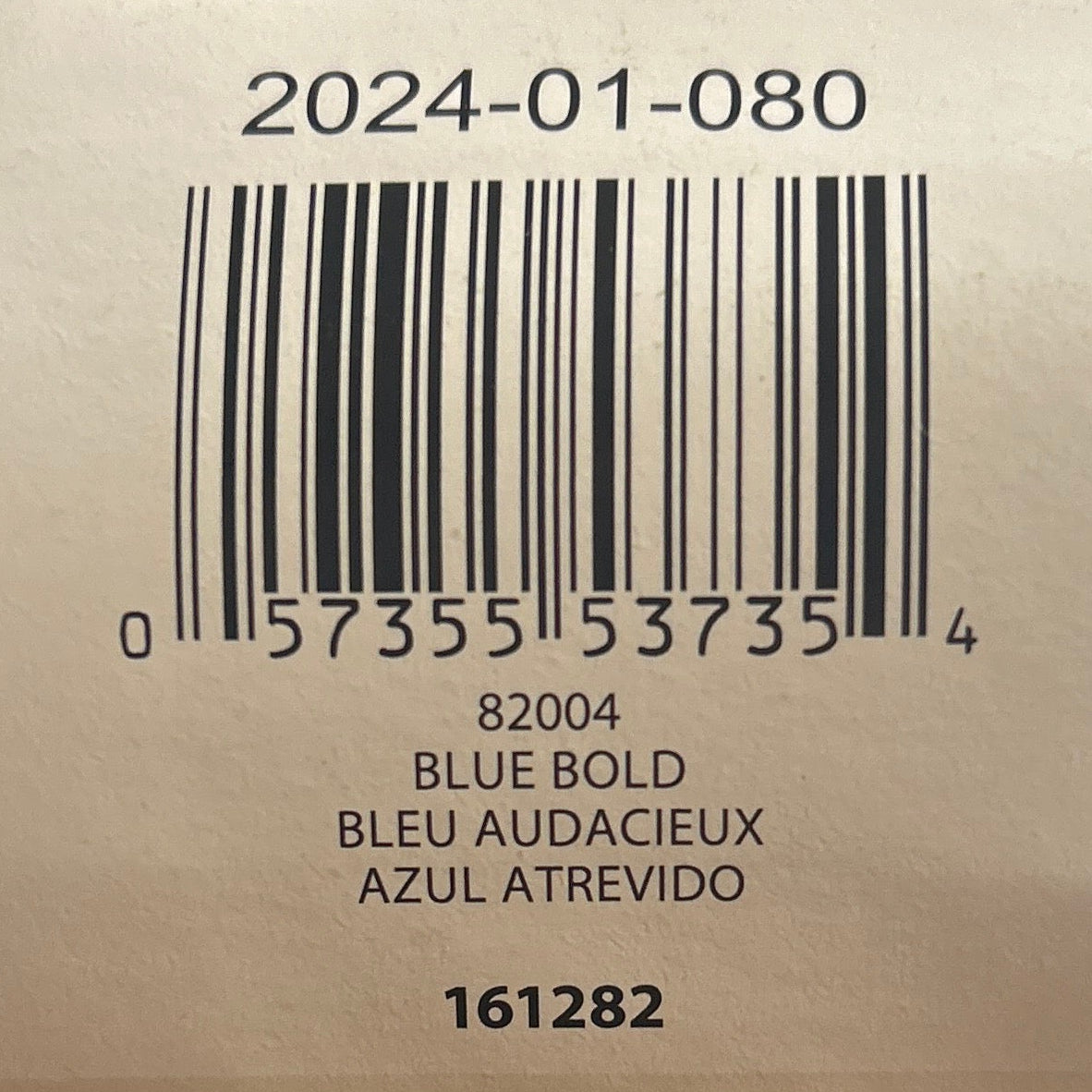 Close-up of a product label with a barcode on a textured surface
