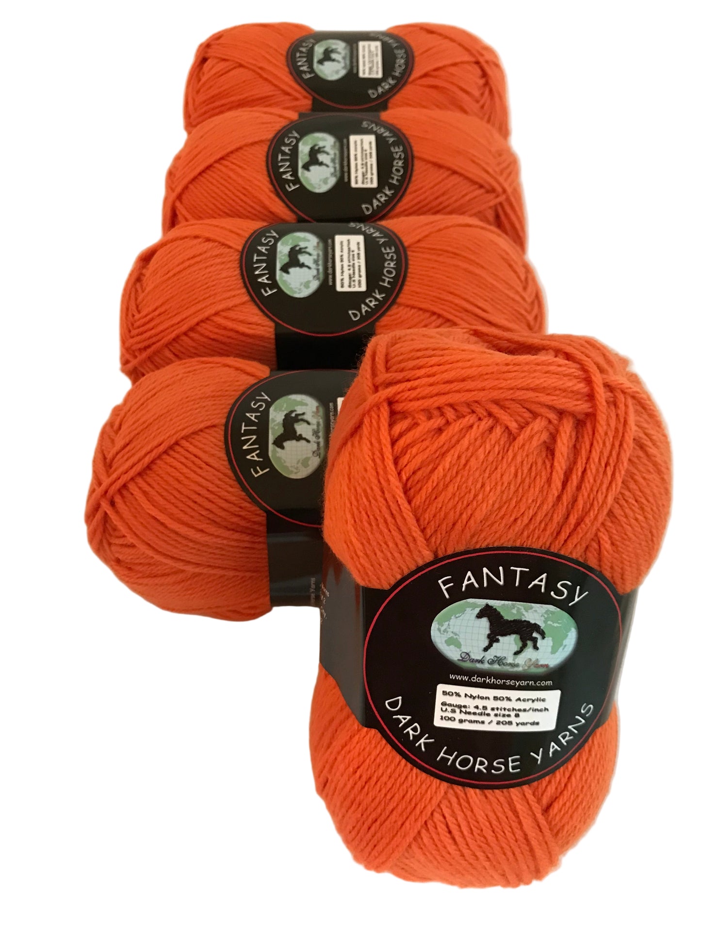 Four balls of orange yarn with 'Fantasy Yarns' labels on a white background