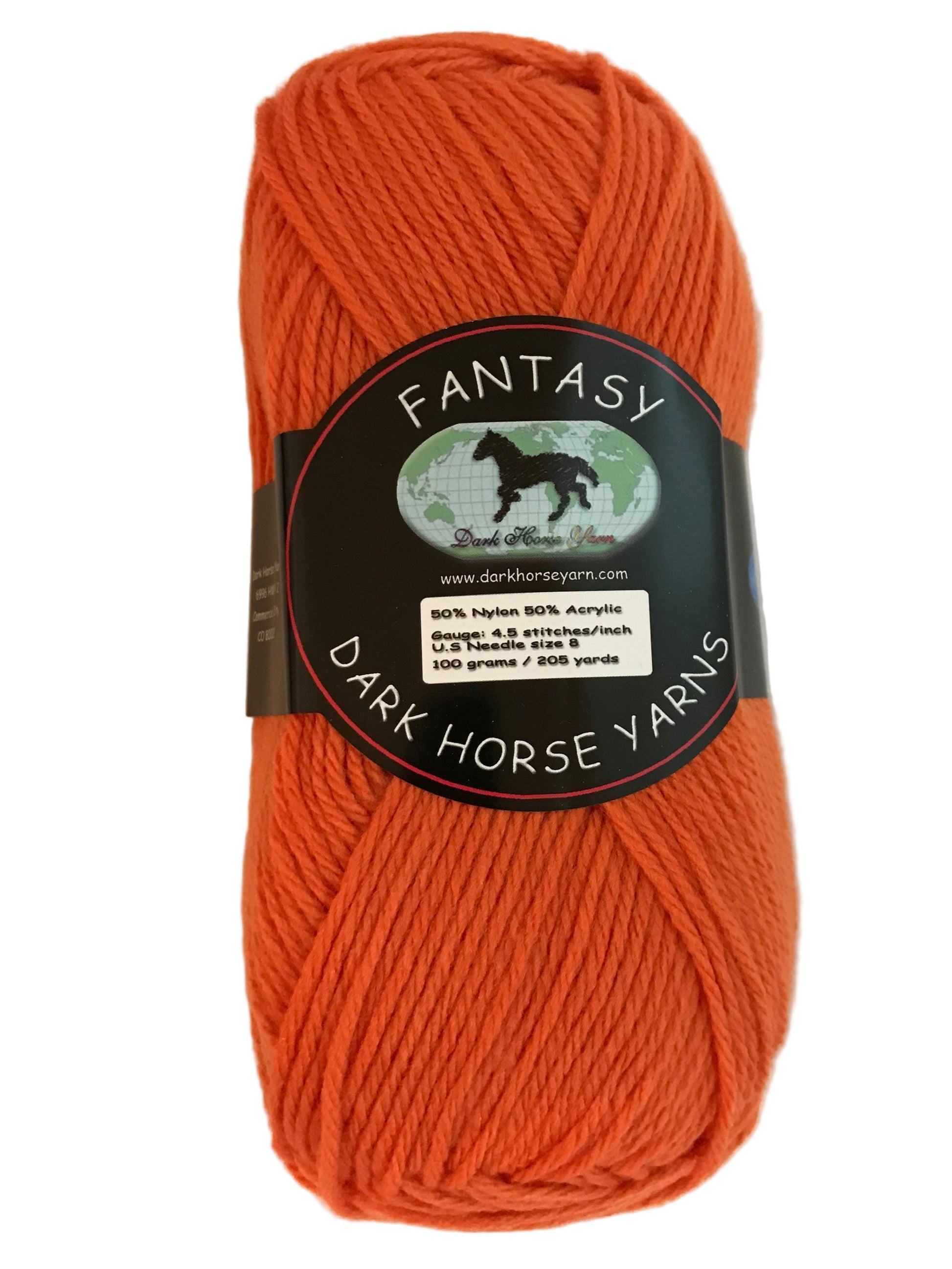 Ball of orange yarn with a label on a white background