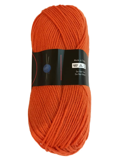 Orange skein of yarn with a label on a light beige background