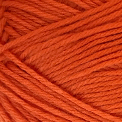 Close-up of bright orange yarn