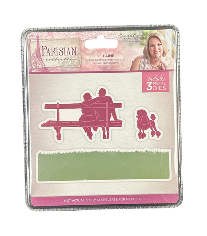 Packaging of metal dies with a couple on a bench and poodle design, labeled 'Parisian Collection'.