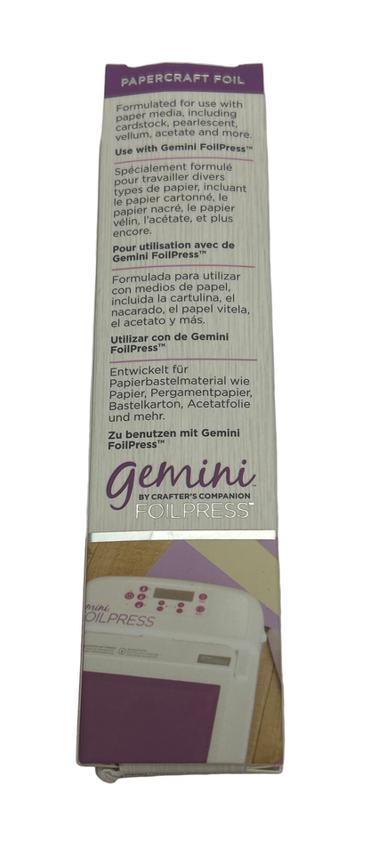 Box of Gemini Crafters Companion paper crafting machine on a textured surface