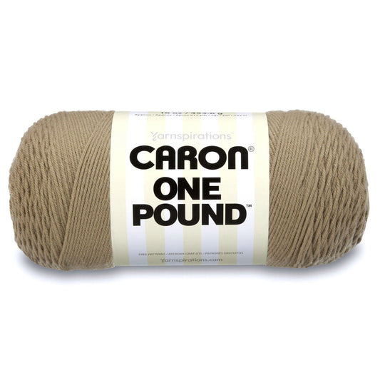 Ball of yarn with Caron One Pound label on a white background