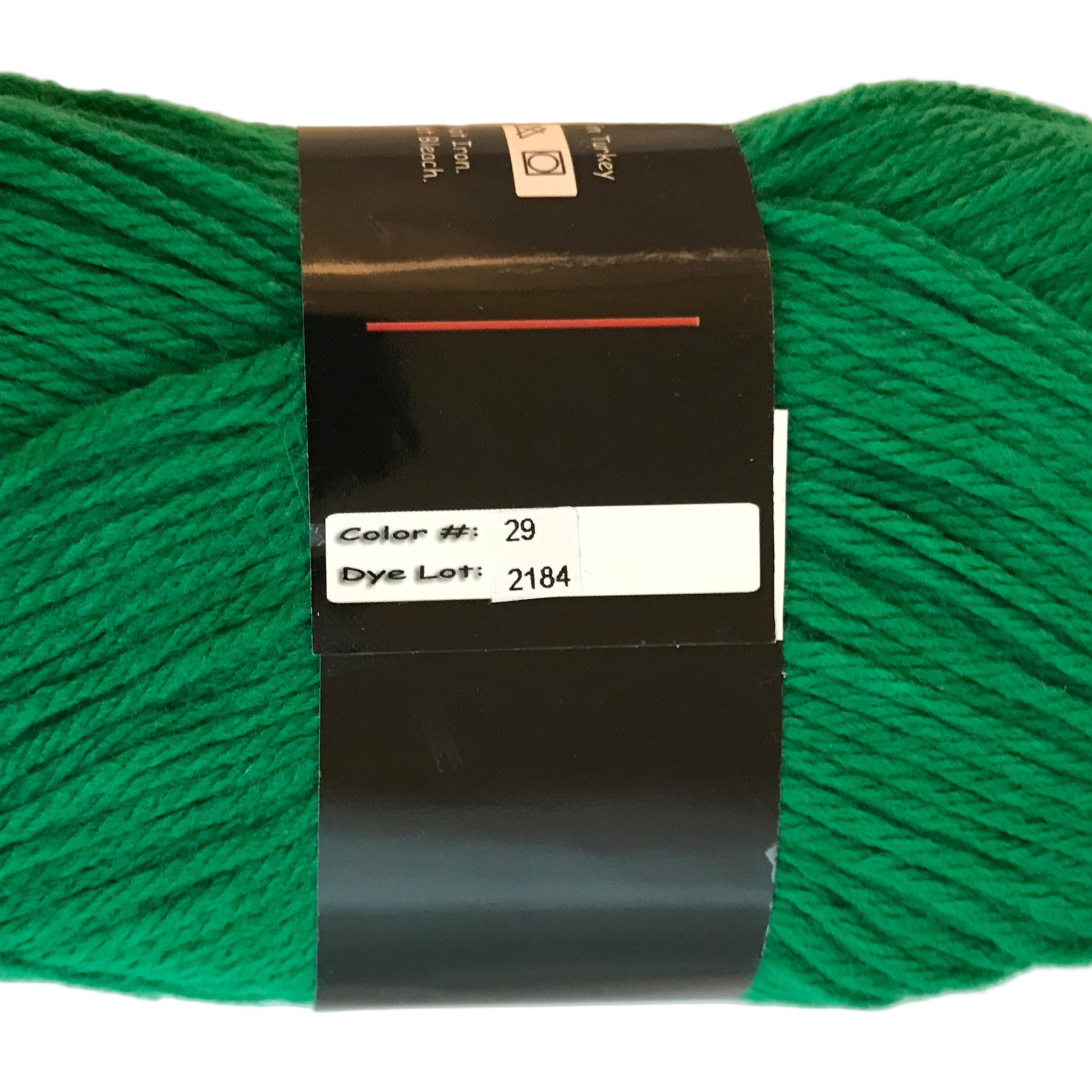 Green skein of yarn with a label on a white background