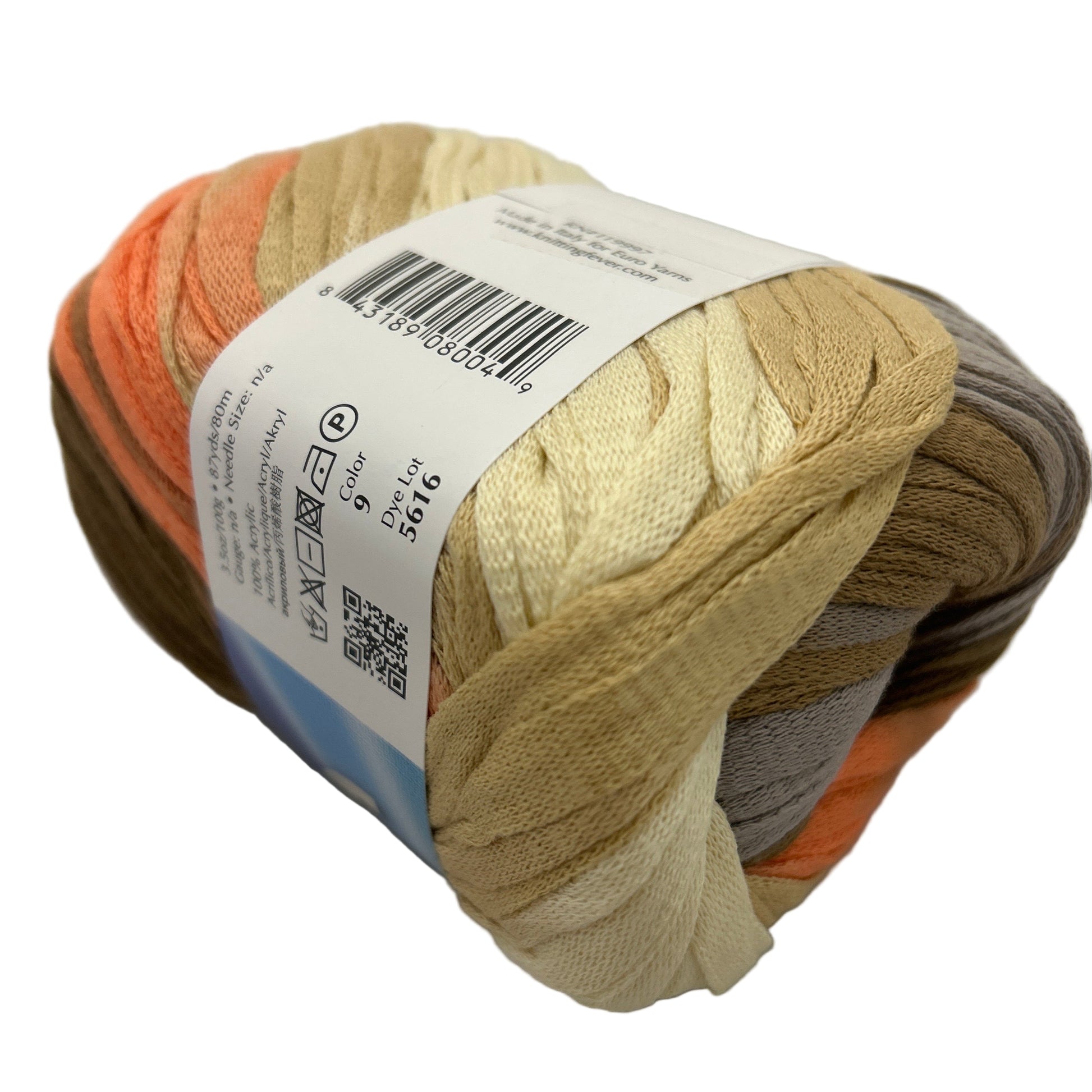 Ball of yarn with a label on a light gray background
