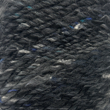 Ball of gray yarn on a white background