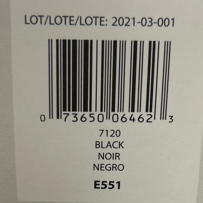Product packaging with a label on a wooden surface