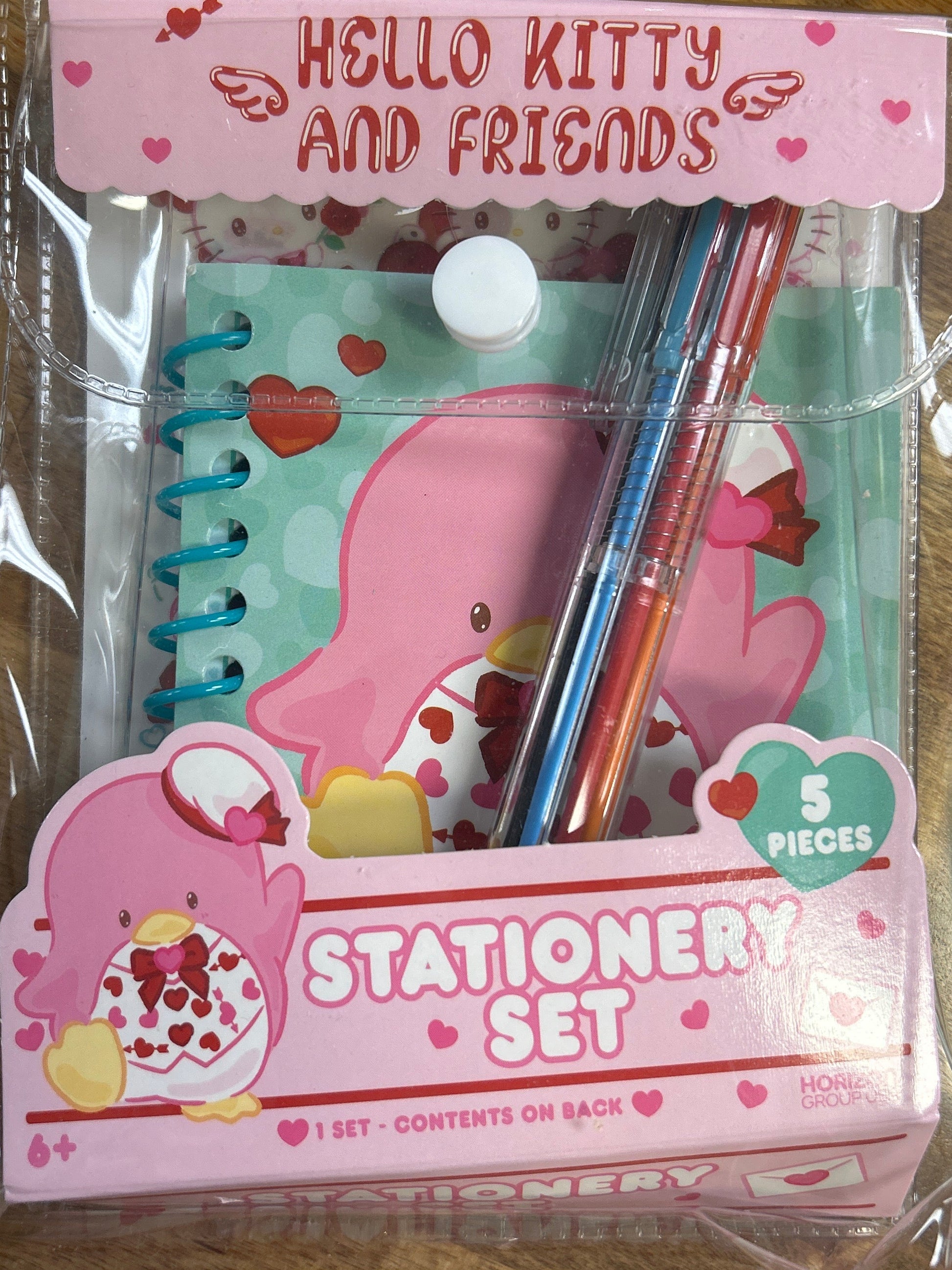 Hello Kitty and Friends stationery set with notebook, pens, and stickers in packaging