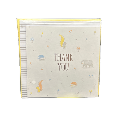Baby blanket with animal illustrations and 'Thank You' text on a white background