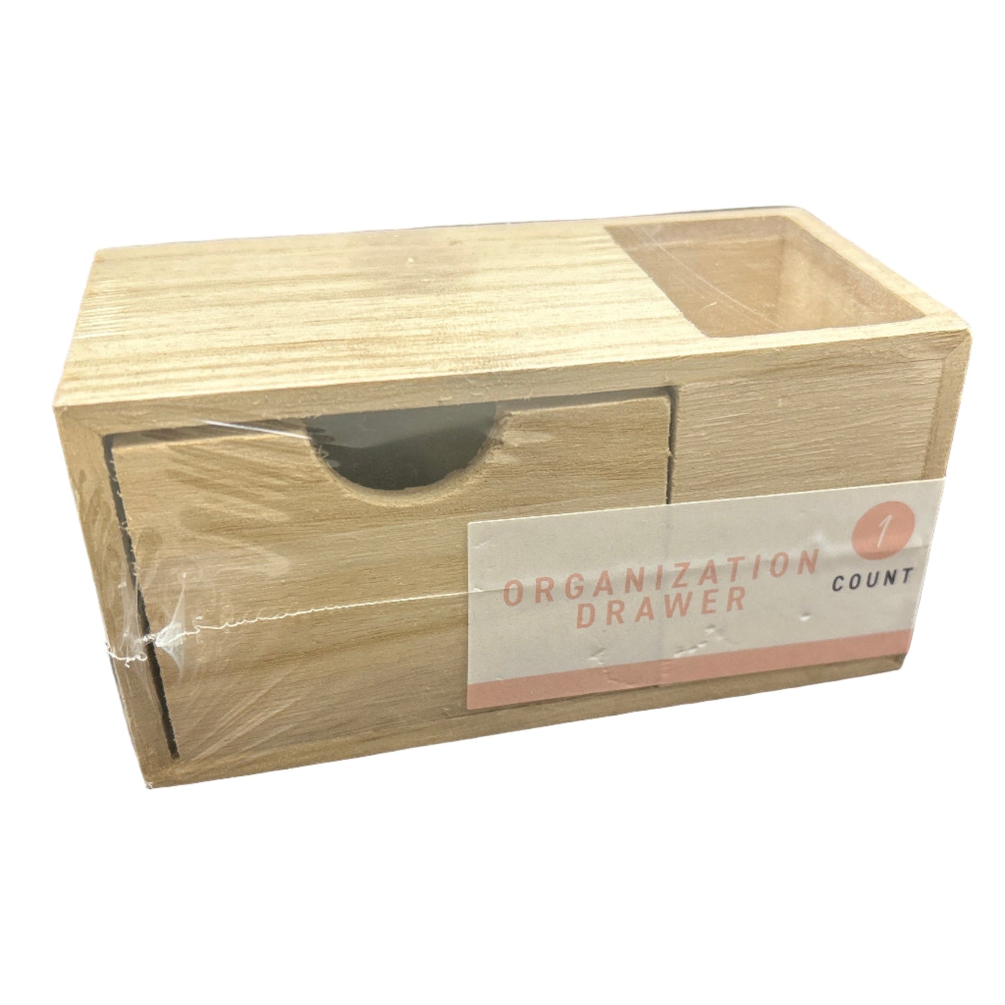 Wooden organization drawer with a label on a dark background