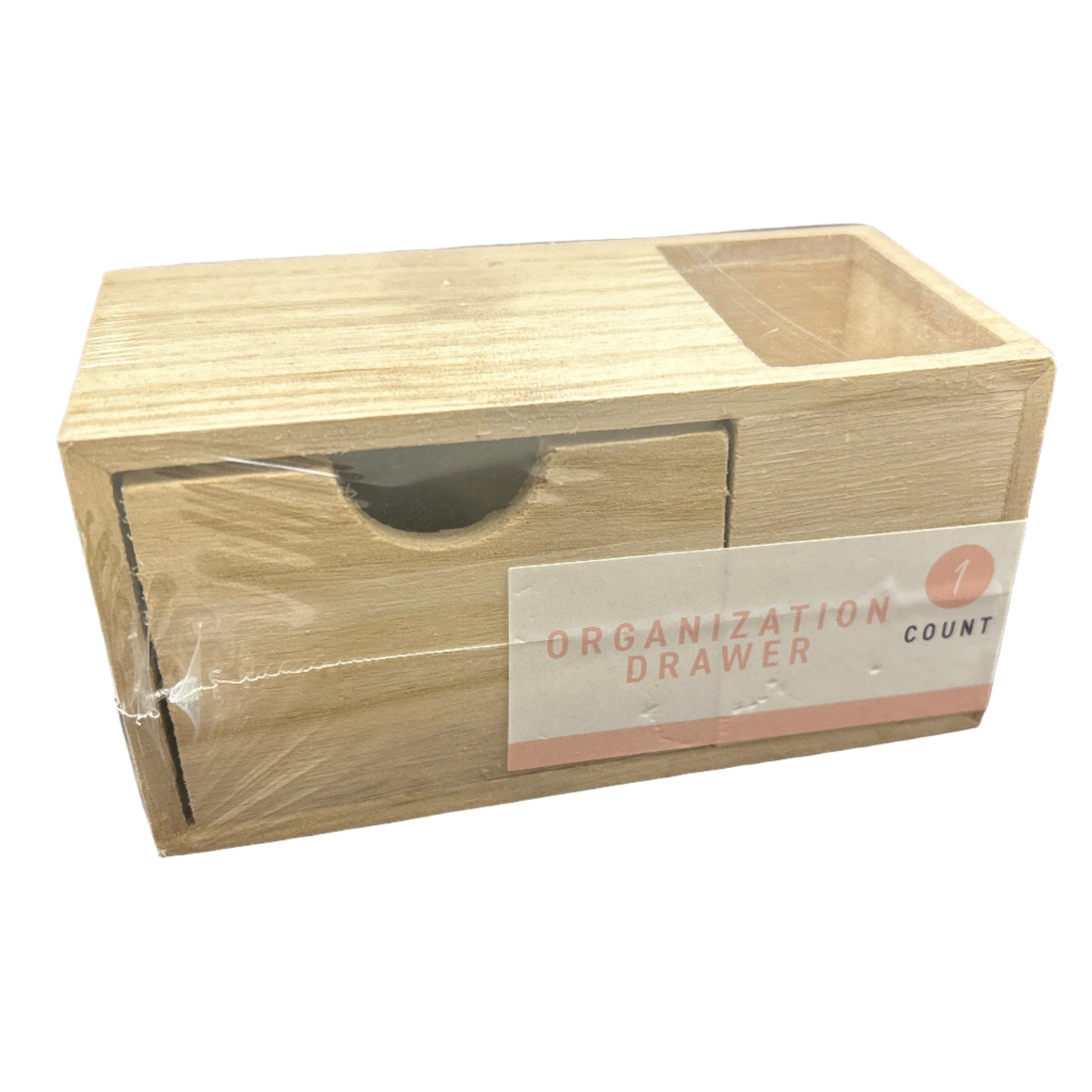 Wooden organization drawer with a label on a dark background