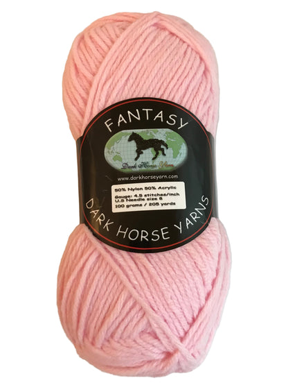 Pink yarn ball with a label on a white background