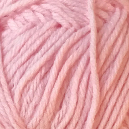 Close-up of pink yarn with a gradient effect.