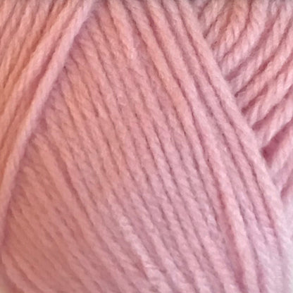 Close-up of pink yarn with a soft focus