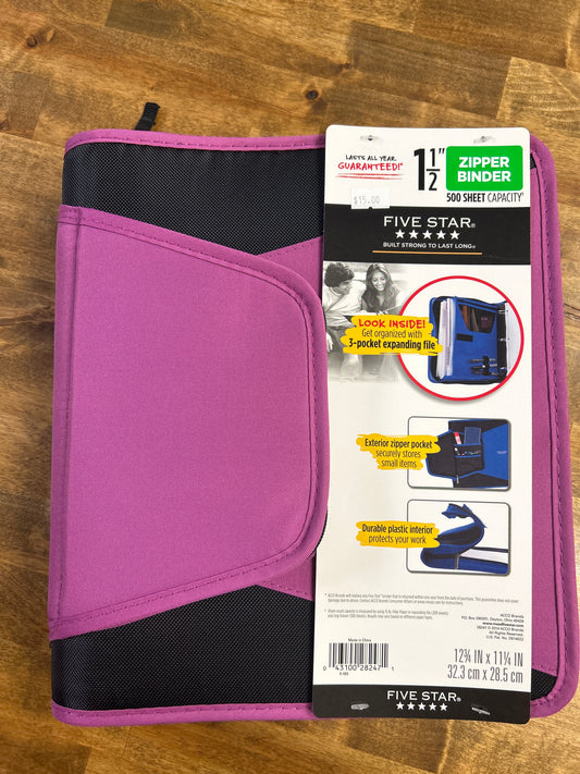 Purple five-star binder with a visible brand label on a wooden surface