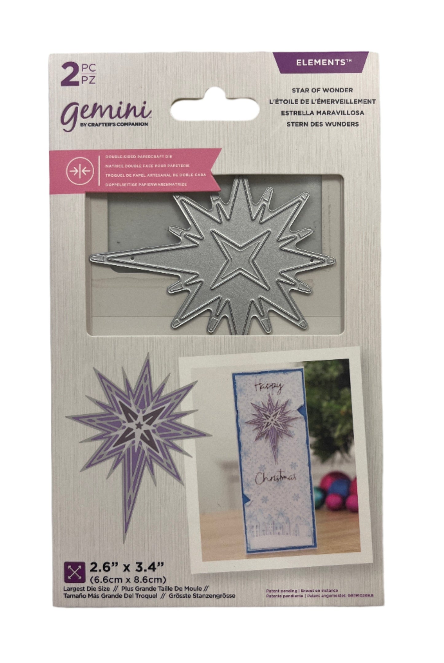 Package of Gemini star-shaped cutting dies with a sample card and die on a white background