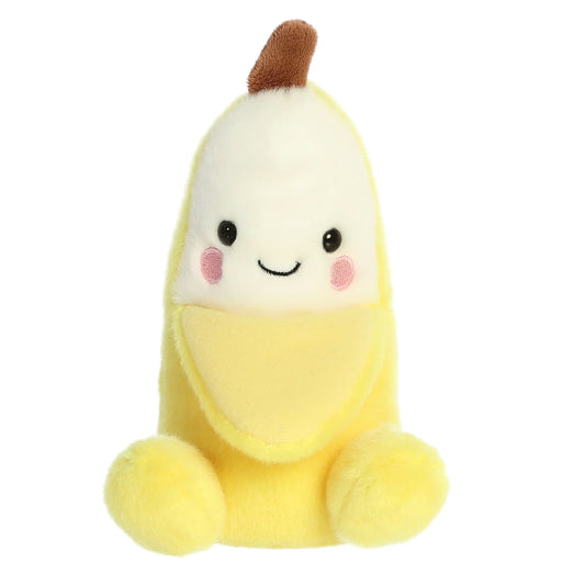 Plush toy shaped like a banana with a smiling face on a white background