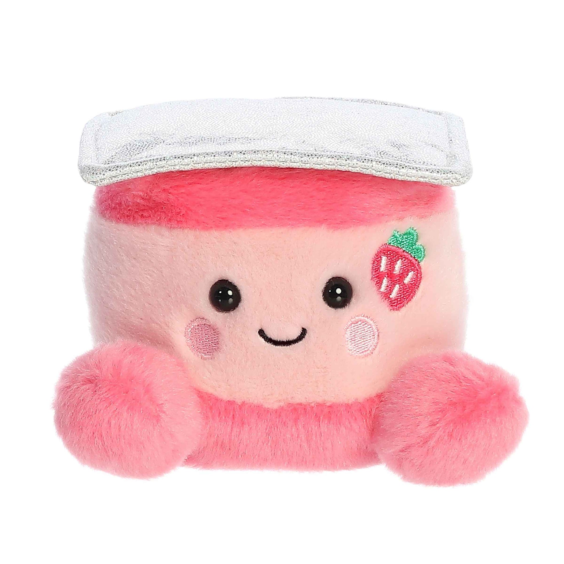 Plush toy with pink hair, white hat, and strawberry design on a white background
