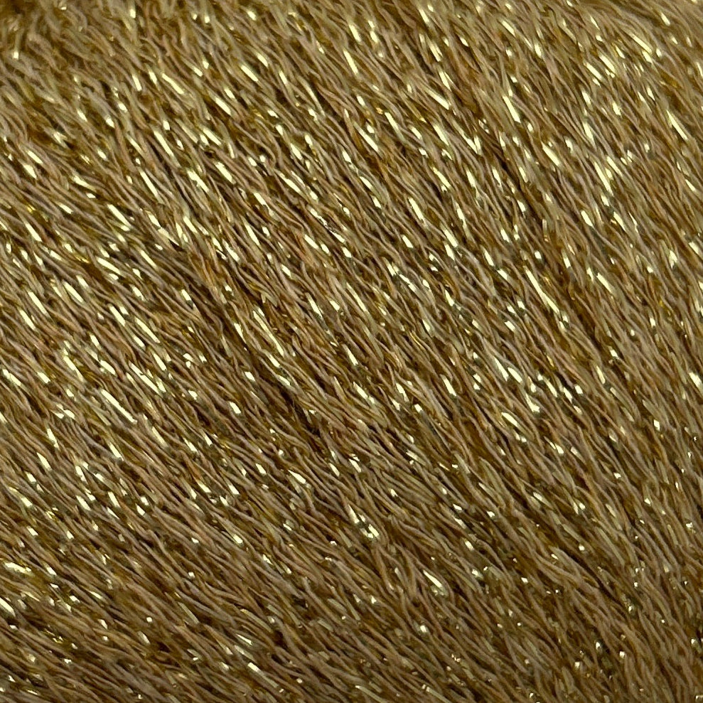 Close-up of brown yarn with metallic thread