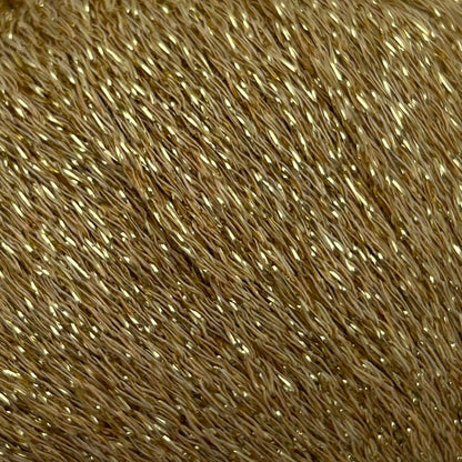 Close-up of brown yarn with metallic thread