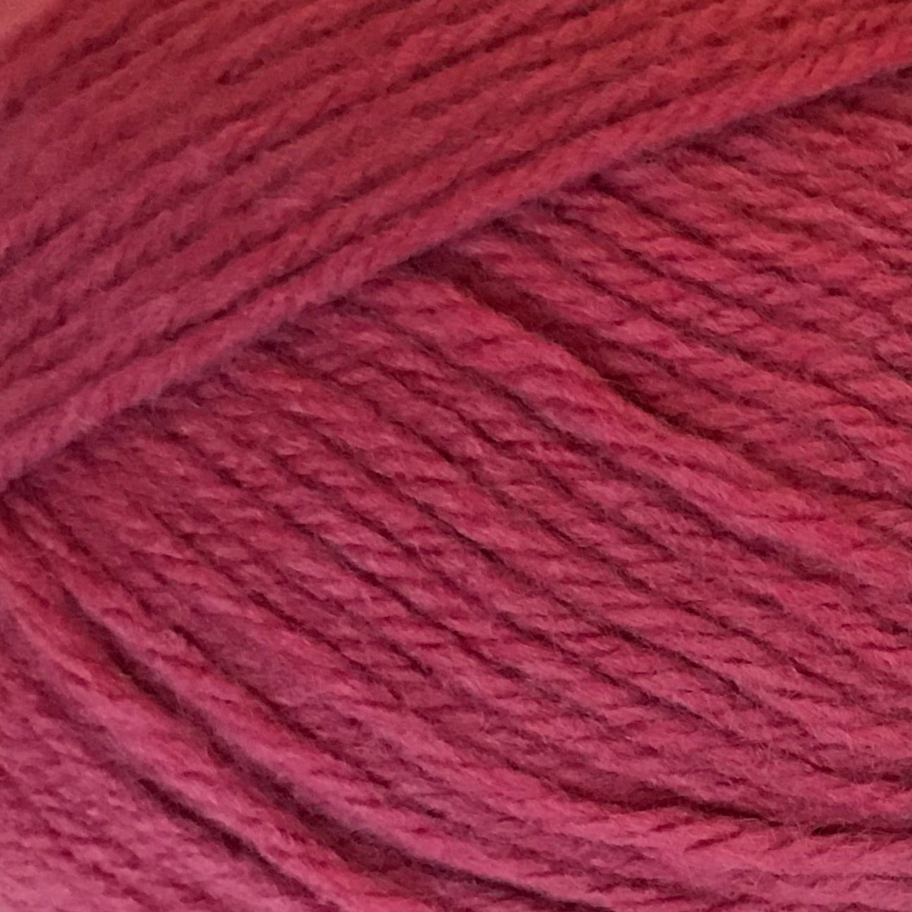 Close-up of a ball of pink yarn