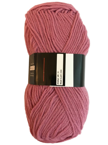 Ball of pink yarn with a label on a white background