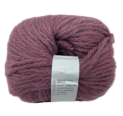 Ball of yarn with a label on a white background