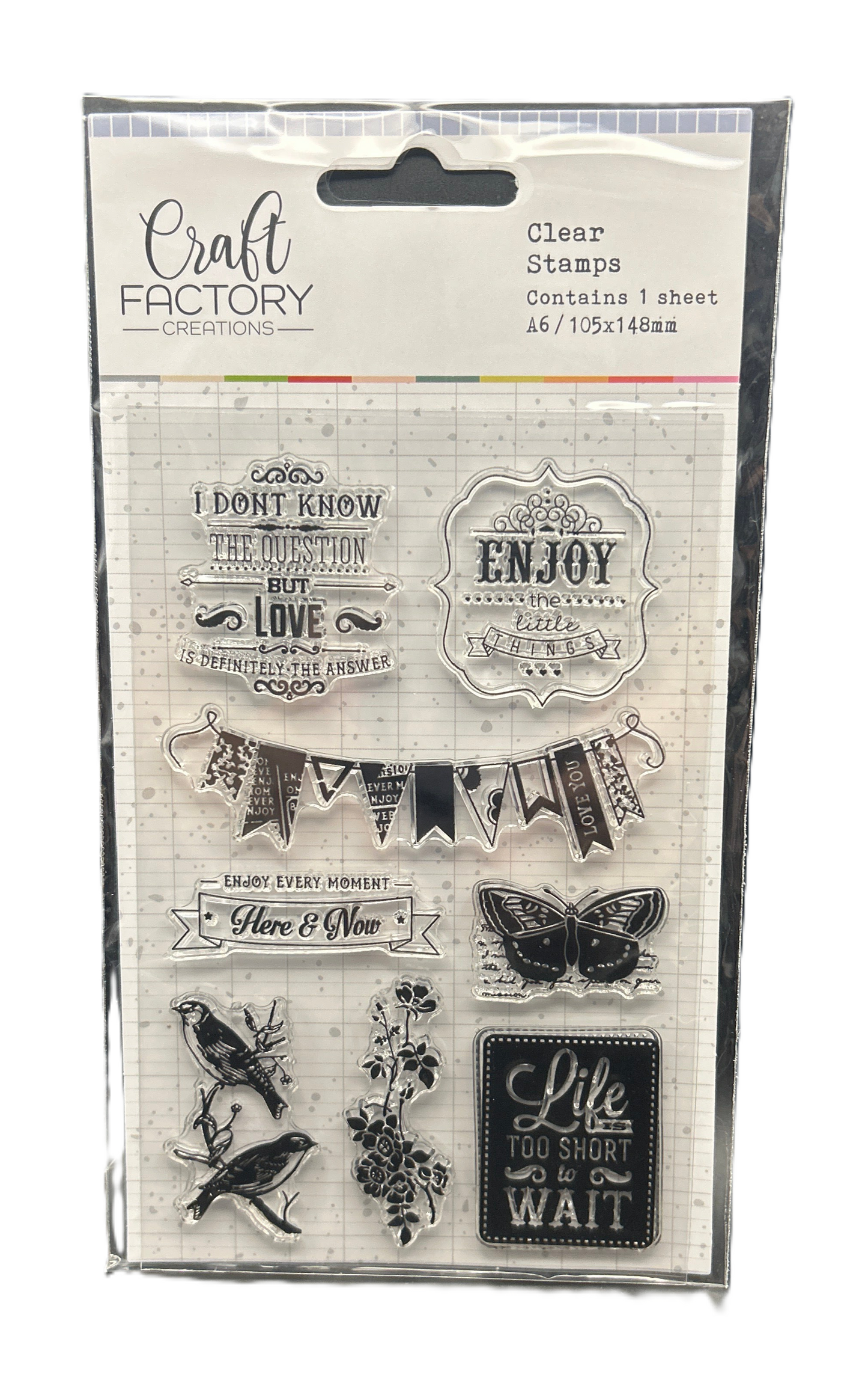 Packaged clear stamps with various designs and text from Craft Factory Creations.