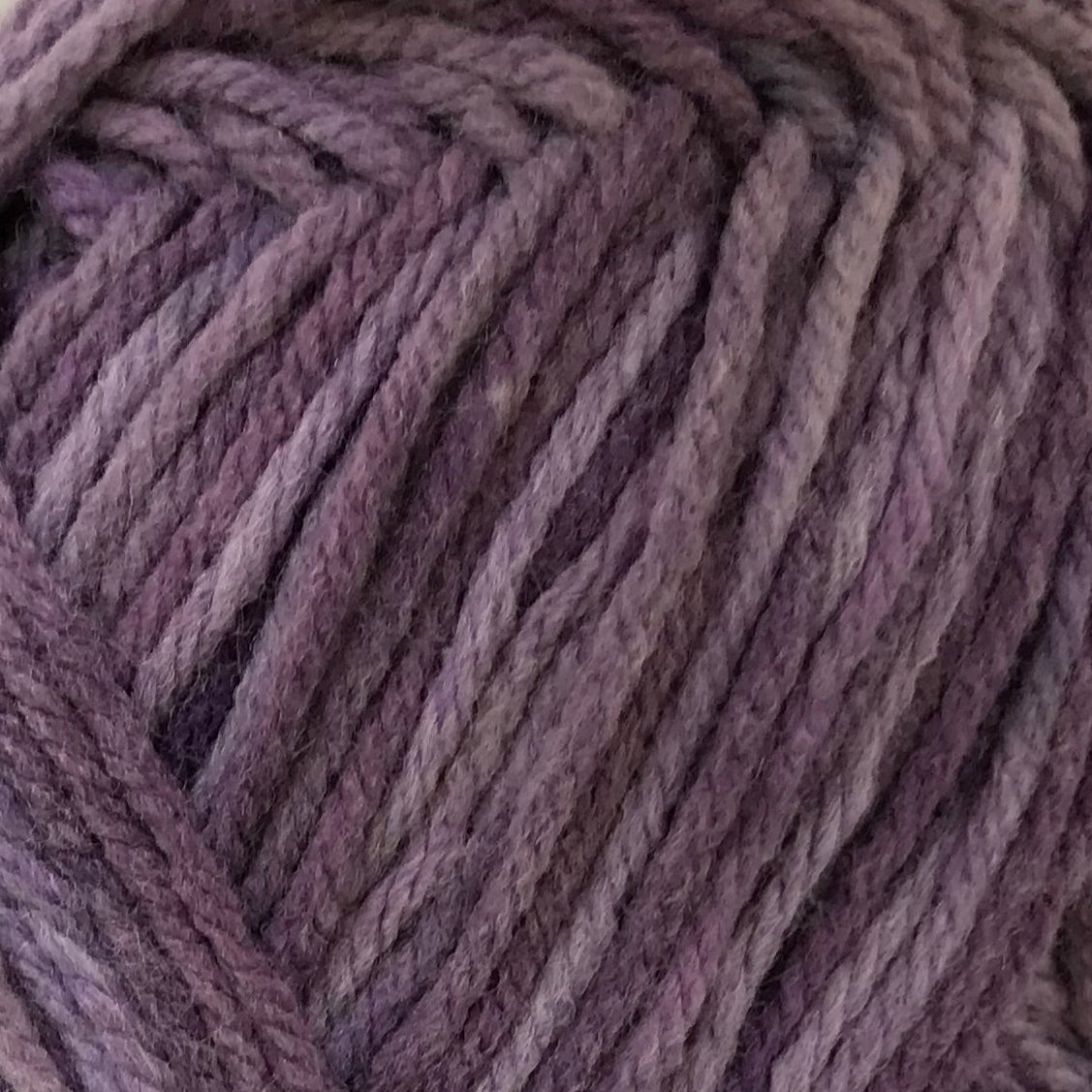 Close-up of a ball of purple yarn