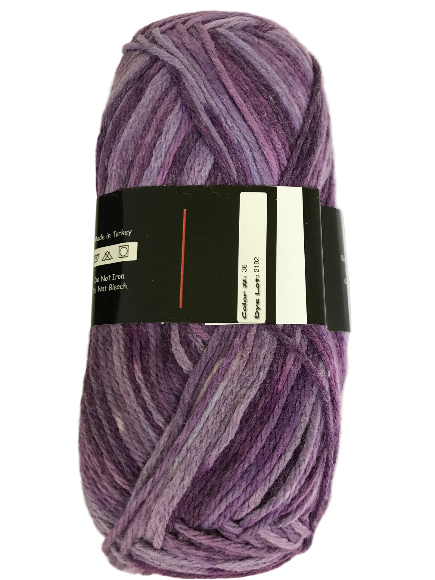 Ball of purple yarn with a label on a light background
