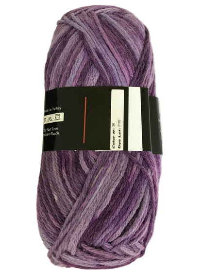 Ball of purple yarn with a label on a light background