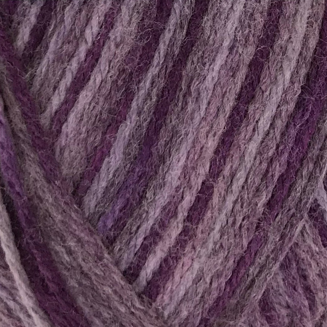 Close-up of purple and gray yarn with a textured pattern