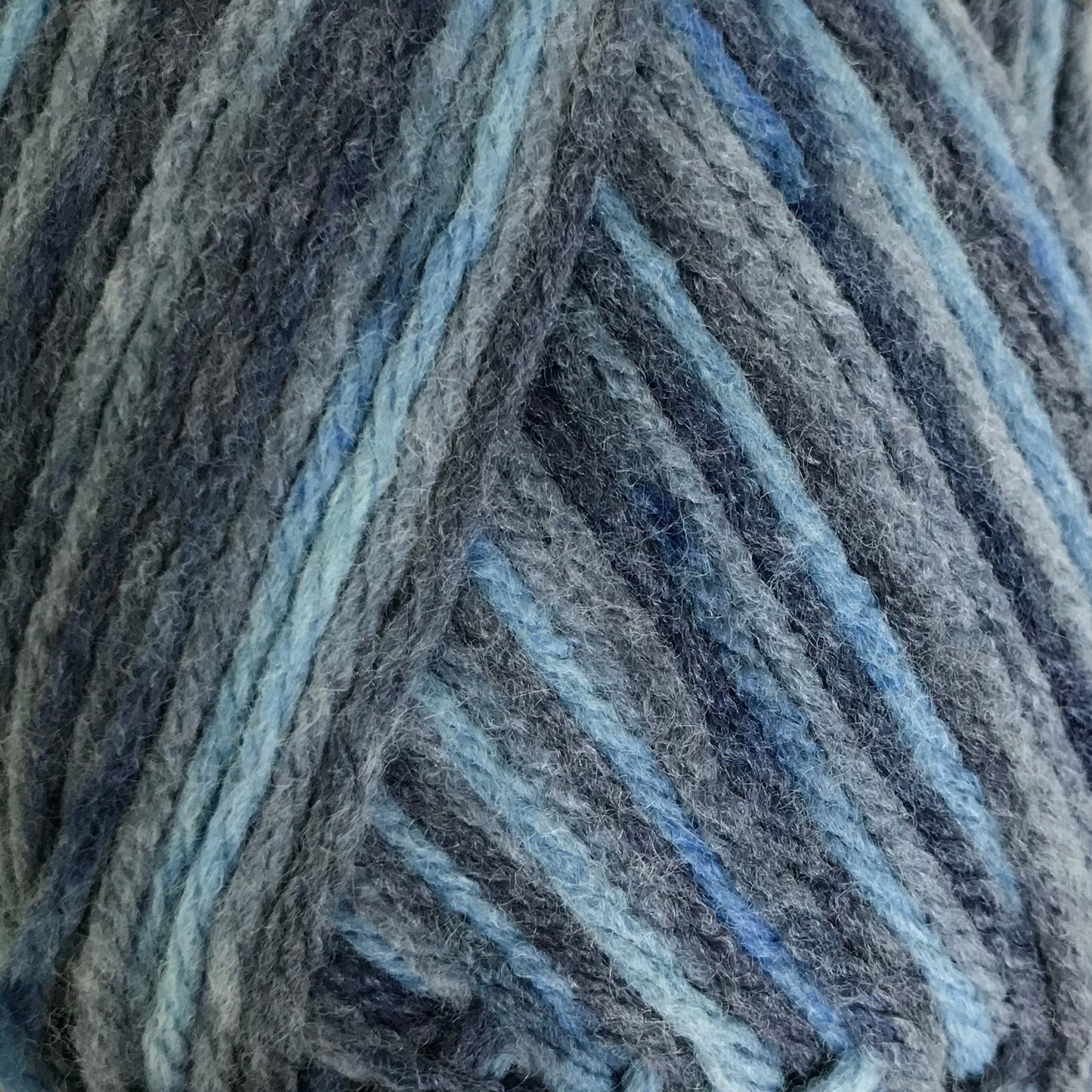 Blue striped yarn ball on a white background