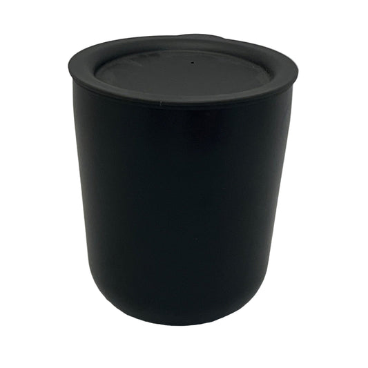 Black mug with lid on a white background