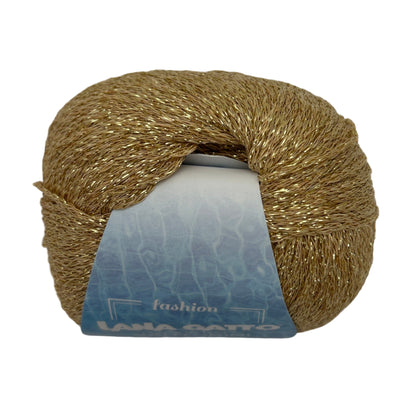 Ball of gold yarn with a blue label on a white background