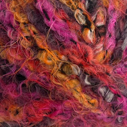 Multicolored skein of yarn on a white background