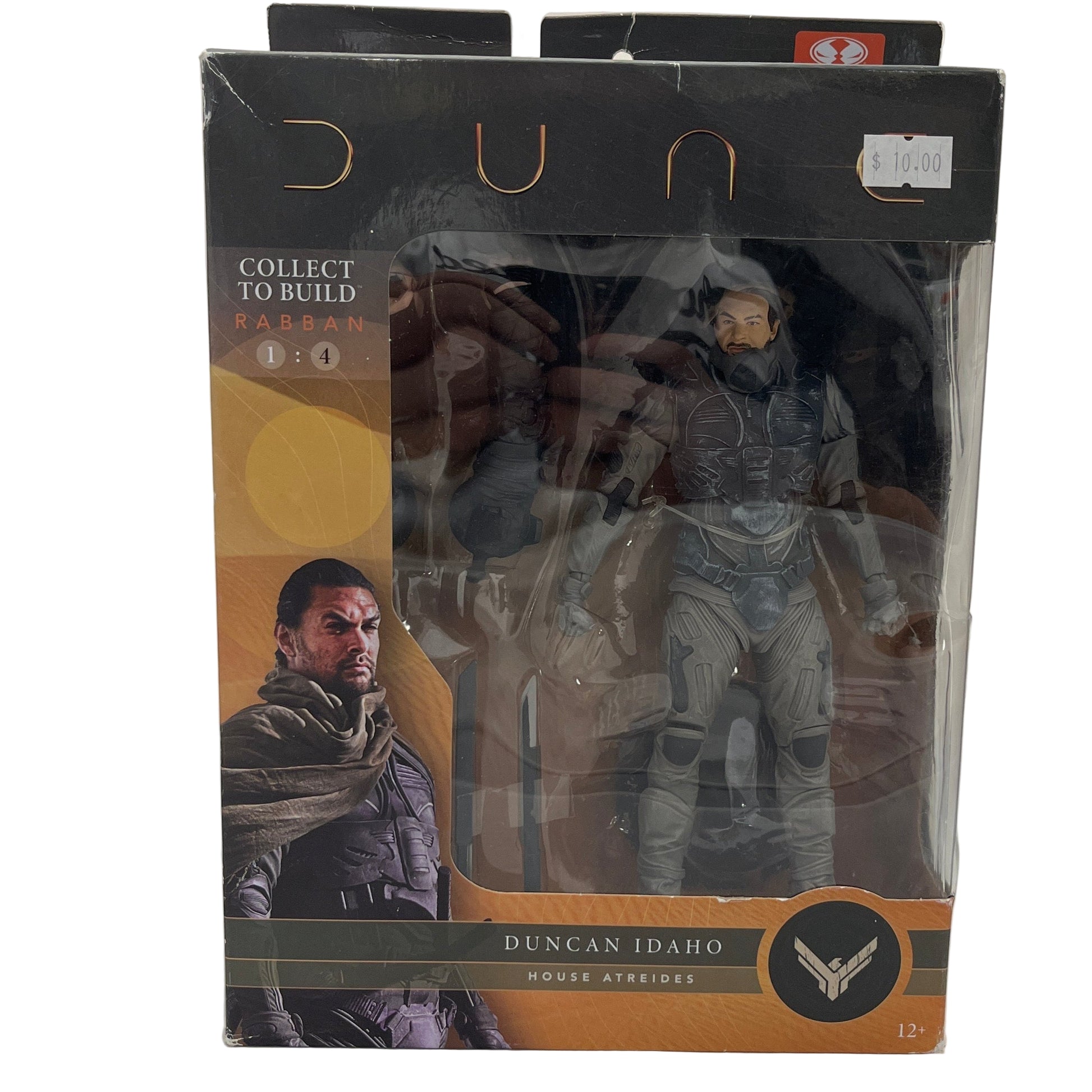 Figure packaging with character illustration and text on a white background