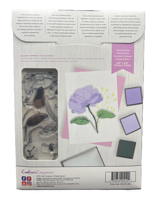 Packaging of a stamp set with floral design and clear stamps.