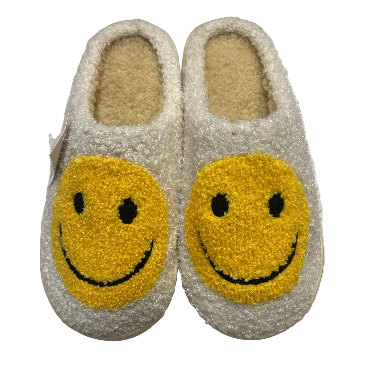 Pair of slippers with smiley face design on a white background