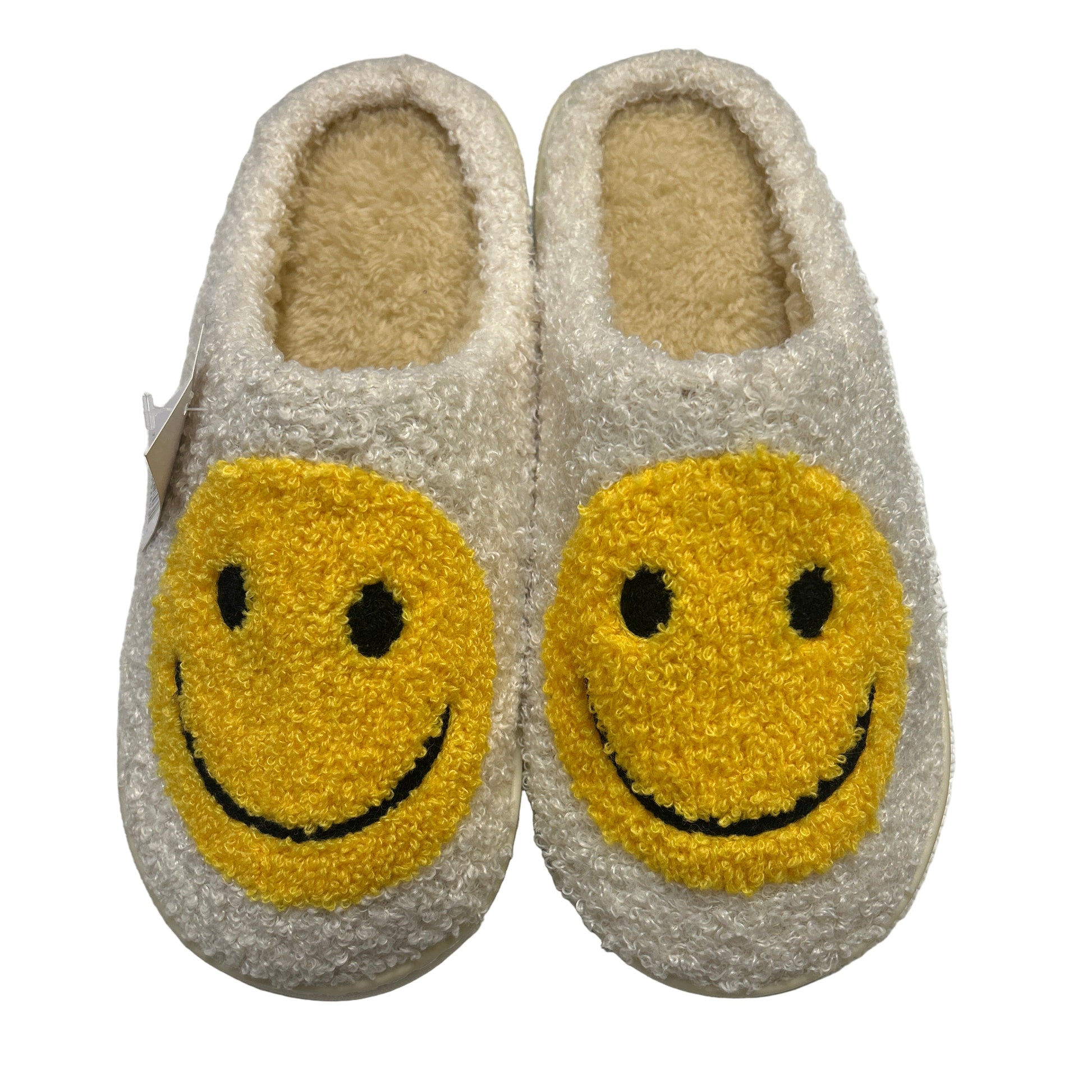 Pair of slippers with smiley face design on a white background