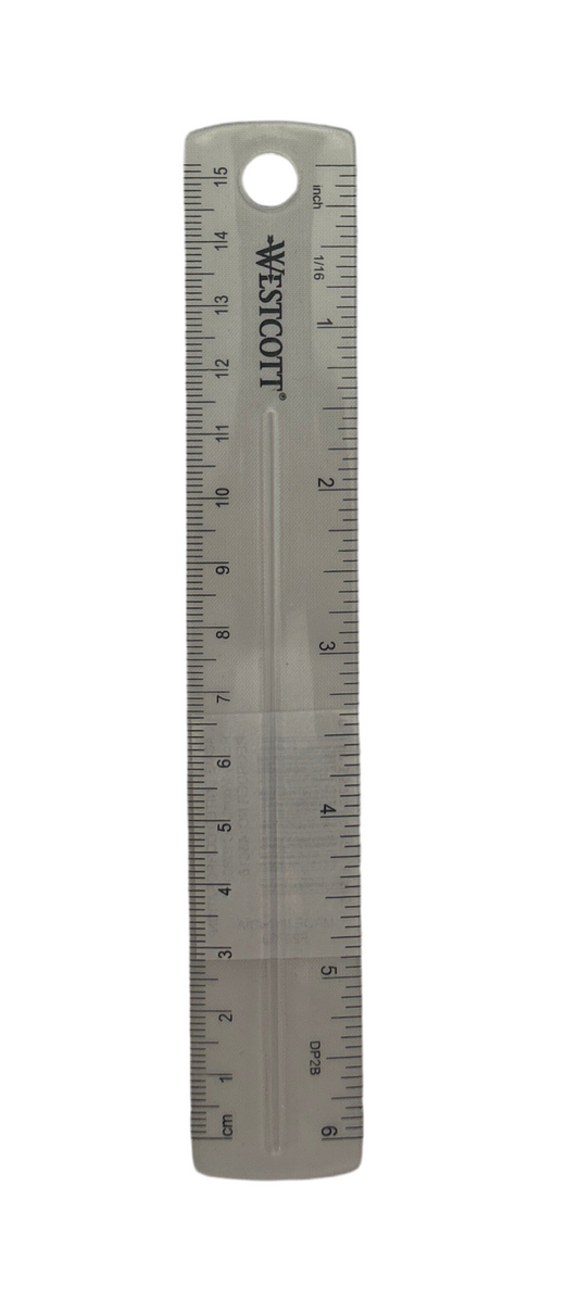 Metal ruler with measurement markings on a white background