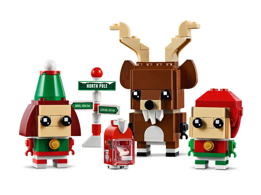 LEGO Christmas set with reindeer, elves, and North Pole sign on a white background