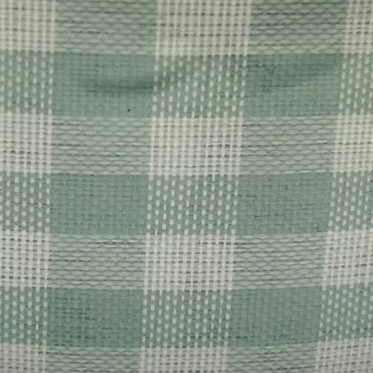 Close-up of green and white checkered fabric pattern