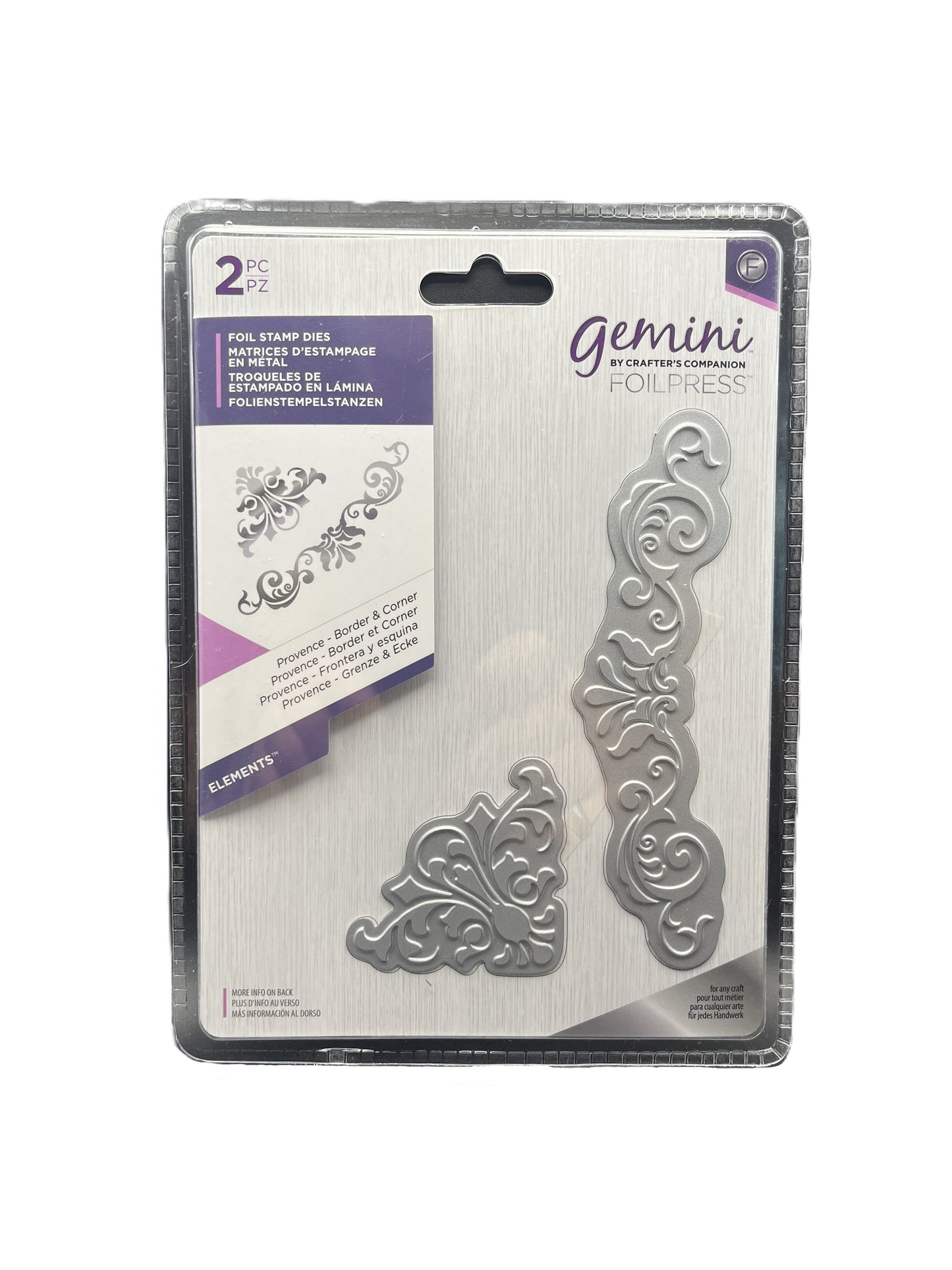 Metal die set packaging with decorative elements on a white background