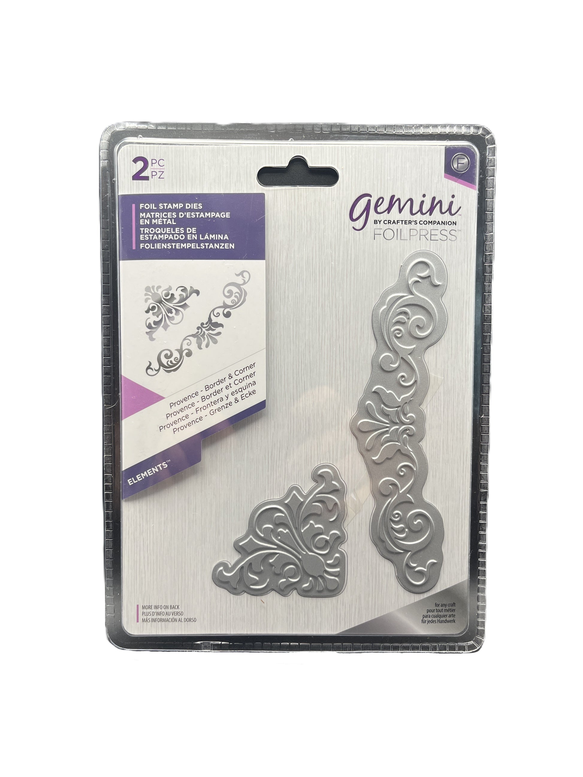 Metal die set packaging with decorative elements on a white background