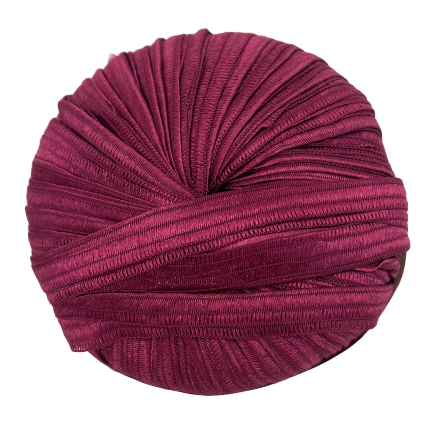 Purple knitted fabric roll on a white background