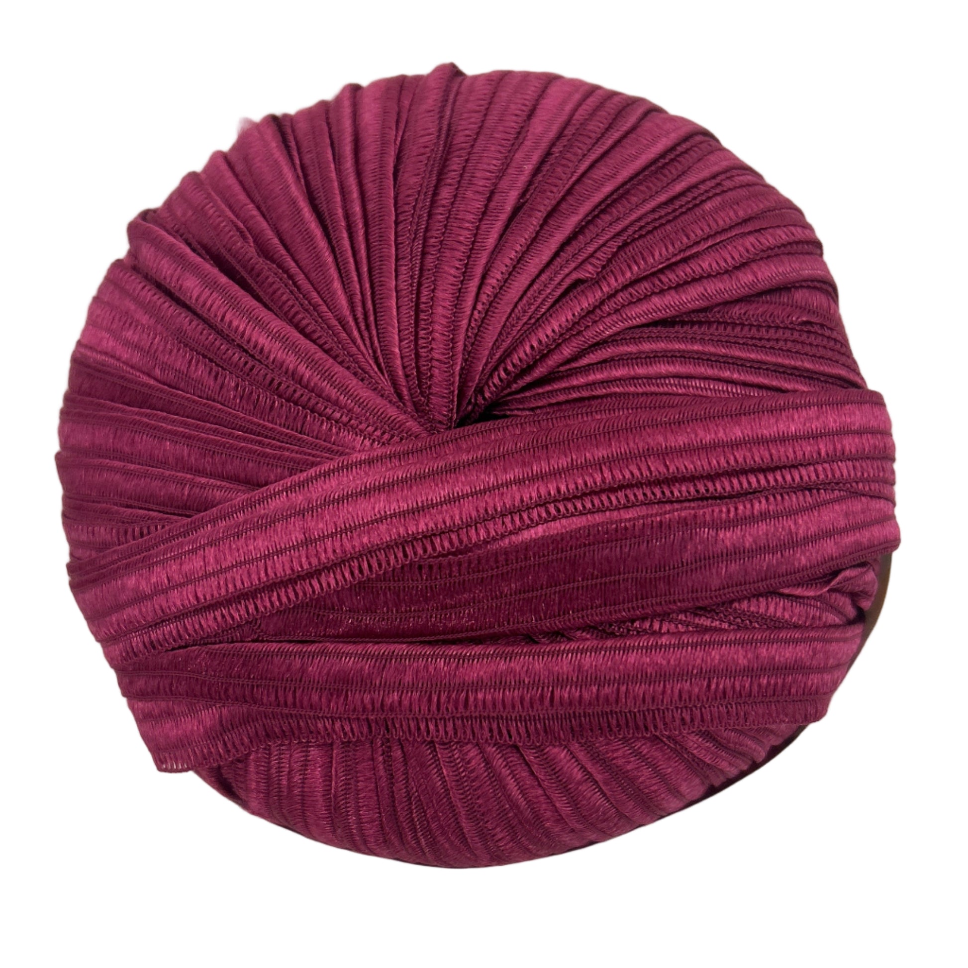 Purple knitted fabric roll on a white background