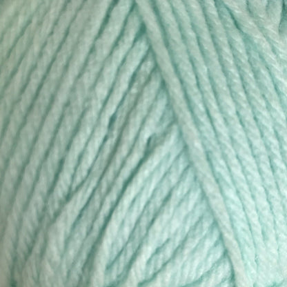 Close-up of light blue yarn with a subtle pattern