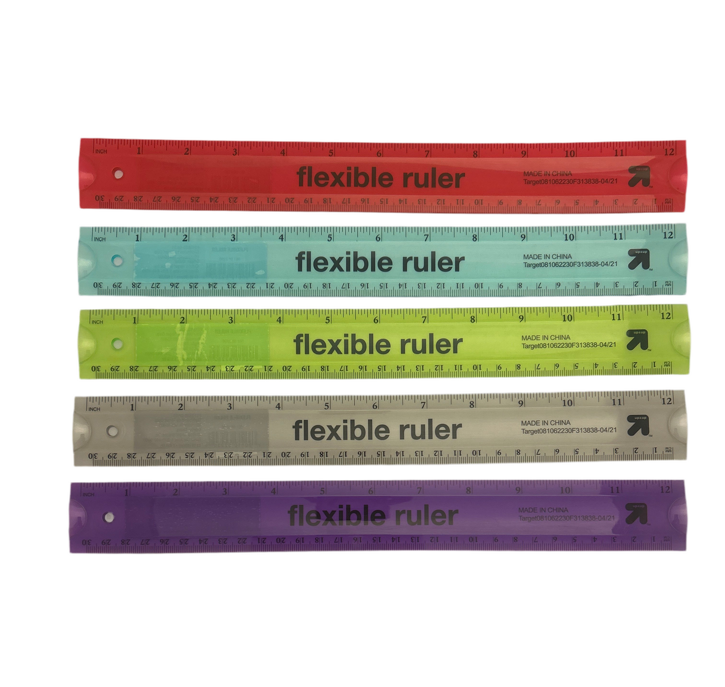 Set of five flexible rulers in different colors on a white background